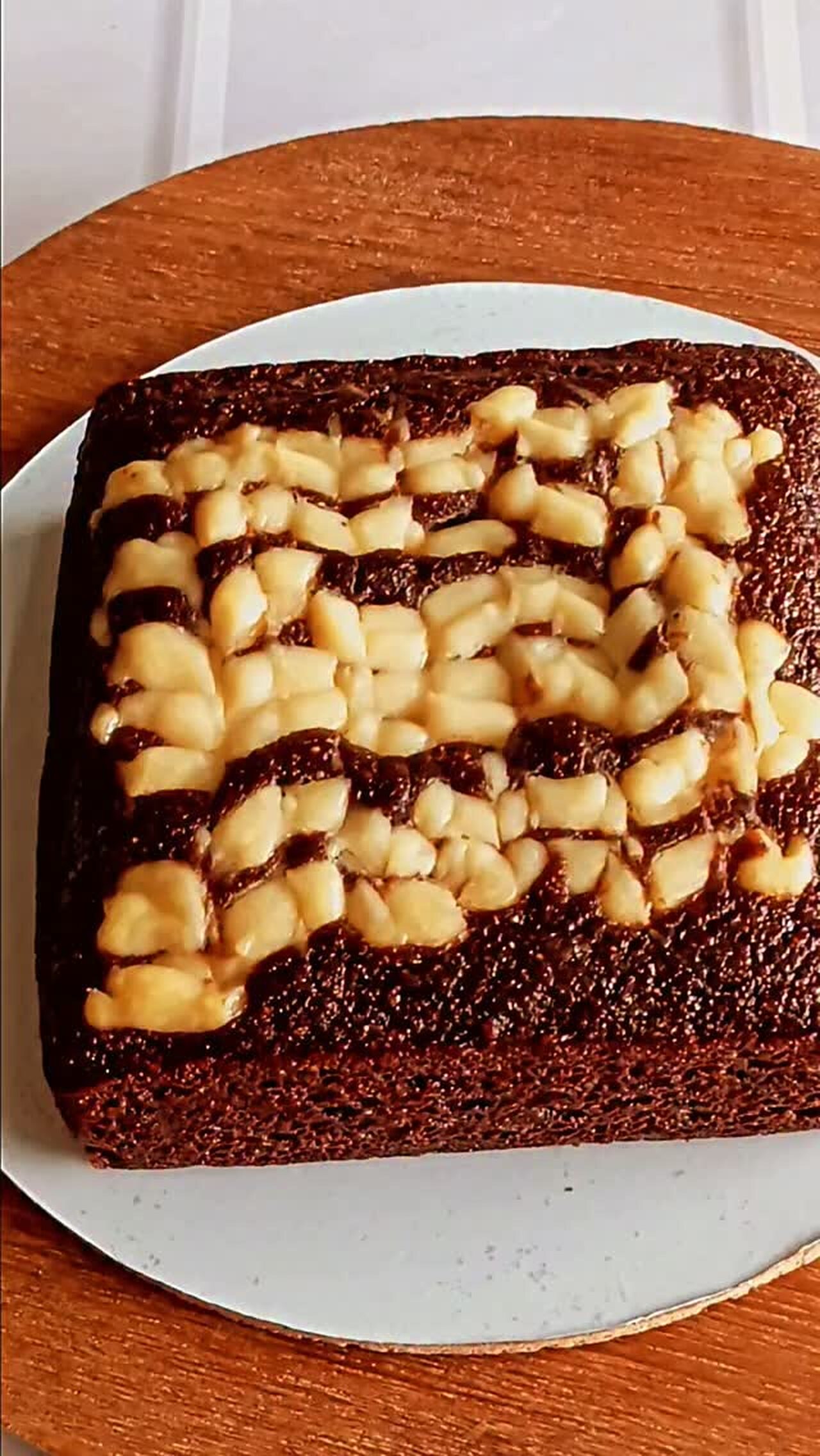 Chocolate cake with white chocolate drizzle