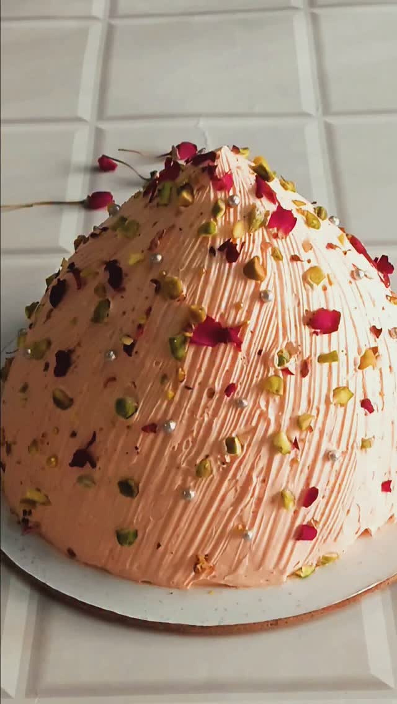 Pink dome cake with pistachio